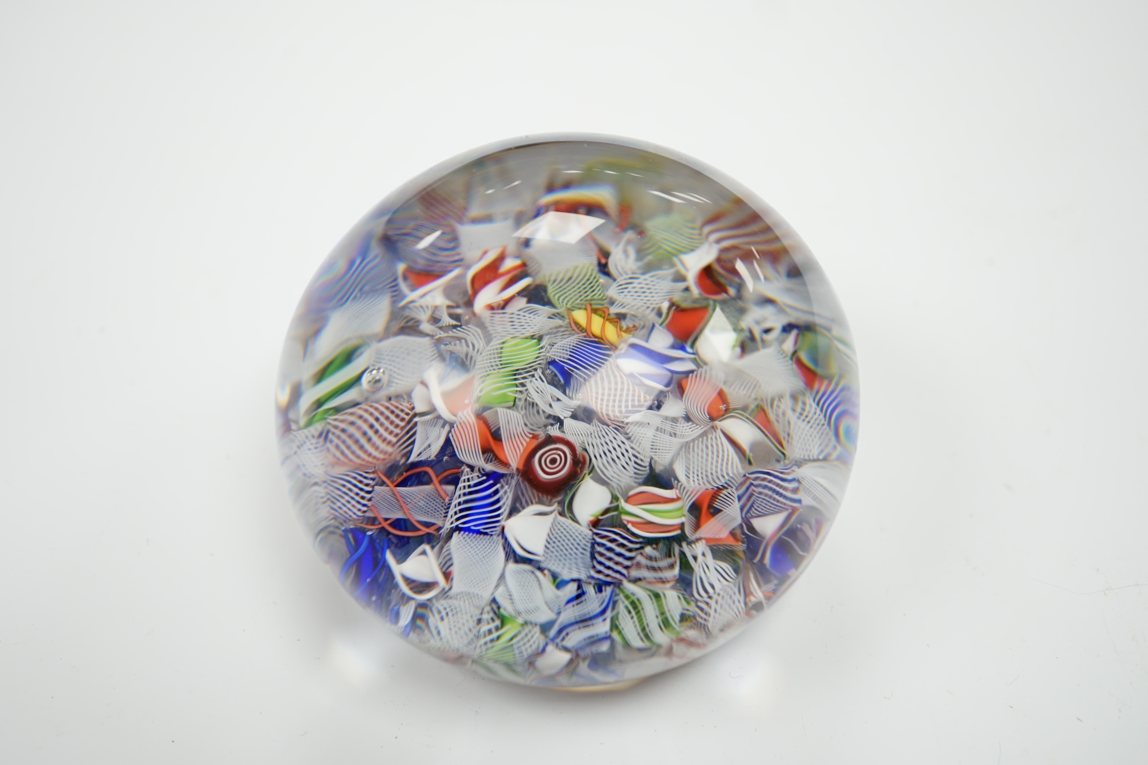 A Baccarat scrambled glass paperweight, 7.5cm in diameter